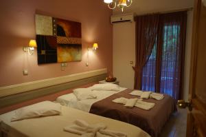 A bed or beds in a room at Nontas Home
