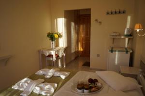 A bed or beds in a room at Nontas Home