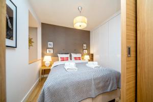 Posteľ alebo postele v izbe v ubytovaní Golden Apartment with Air Condition by Your Freedom + 9 fotografií