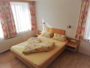 Postel nebo postele na pokoji v ubytování Ködnitzhof