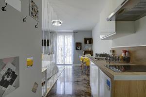 a kitchen with a sink and a counter top at STUDIO LE MOUTARDE in Dijon