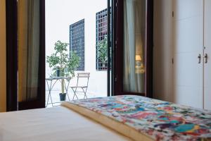 A bed or beds in a room at New Amor de Dios