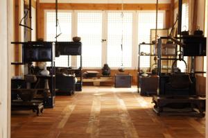 a room with a large window and a wooden floor at Korean Traditional House - Chungnokdang in Boseong