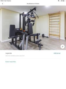 a screenshot of a gym with a treadmill at Amora Três in Sao Paulo