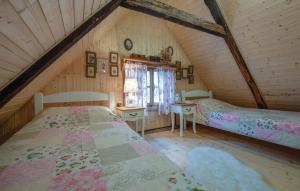 Tempat tidur dalam kamar di Grebengradska Medna Hiža