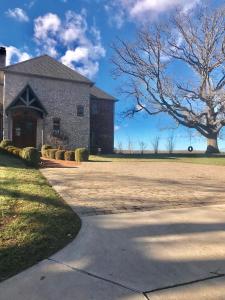 a house with a driveway in front of it at Affordable Luxury Mansion in Quincy