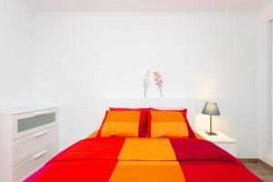 Ein Bett oder Betten in einem Zimmer der Unterkunft Medano Townhouse
