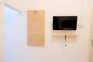 TV a/nebo společenská místnost v ubytování Kokonut Guesthouse + 8 fotografií