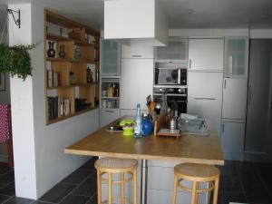 A kitchen or kitchenette at Chambres de Condate