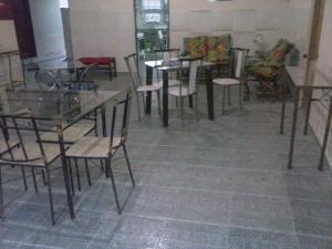 Reštaurácia alebo iné gastronomické zariadenie v ubytovaní CHACARA NOSSA SENHORA DAS DORES