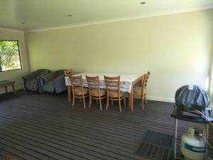 a dining room with a table and chairs at Margaret House in Margaret River Town