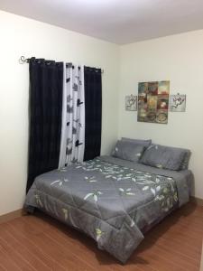 Postel nebo postele na pokoji v ubytování ESTILO APARTMENT 2-storey