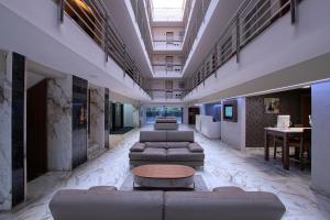 Posezení v ubytování Econo Express Hotel