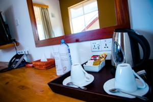 Set per la preparazione di tè e caffè presso Amaranthe Bay Resort & Spa