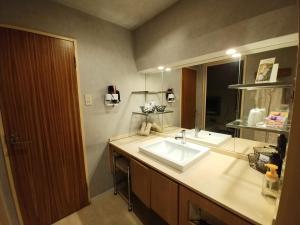 Koupelna v ubytování Hotel Allure (Adult Only)