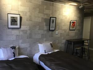 Postel nebo postele na pokoji v ubytování Hotel Sun Road