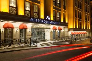 a nighttime view of a metropolitania building at night at Metropolitan Hotels Taksim in Istanbul