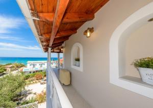 a balcony with a view of the ocean at Villa Eleni - Maisonette with Ocean panorama terrace in Alikanas