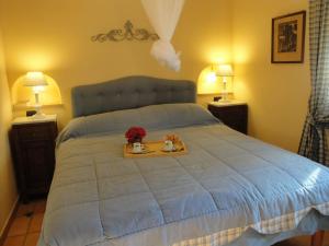 מיטה או מיטות בחדר ב-Villa Stella