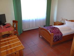 Postel nebo postele na pokoji v ubytování Hotel & Weinstube Restaurant Filling