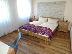 Postel nebo postele na pokoji v ubytování Hotel & Weinstube Restaurant Filling