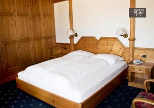 Postel nebo postele na pokoji v ubytování Residence MAYR