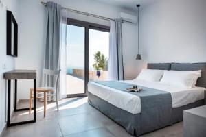 Postel nebo postele na pokoji v ubytování Mystique View Villas