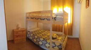 Postel nebo postele na pokoji v ubytování Apartament Casa Bonfill