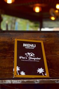 Ein Zertifikat, Auszeichnung, Logo oder anderes Dokument, das in der Unterkunft Pen's Bungalow Koh Phangan ausgestellt ist