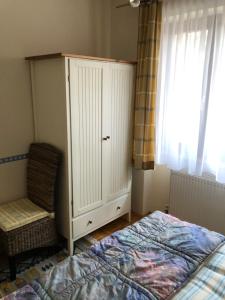 Łóżko lub łóżka w pokoju w obiekcie Haus Camelia