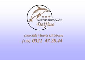 a label for a seafood restaurant with a dolphin in a circle at Albergo Ristorante Il Delfino in Novara