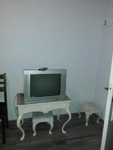 TV in/ali zabaviščno središče v nastanitvi Luxuri Apartment