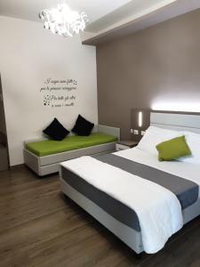 Postel nebo postele na pokoji v ubytování GFH - Hotel Sole Resort & Spa + 37 fotografií