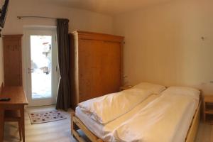 Posteľ alebo postele v izbe v ubytovaní Agriturismo Moiè