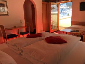 Postel nebo postele na pokoji v ubytování Hotel Garni Bergwelt