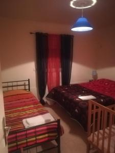 Postel nebo postele na pokoji v ubytování Casa Nogueira