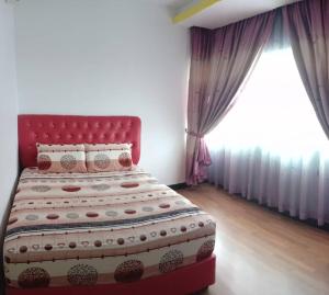 Postel nebo postele na pokoji v ubytování Sekinchan Paddy via Seaview Home 高楼 看海 稻田 民宿