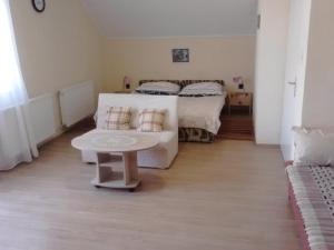 Postel nebo postele na pokoji v ubytování Friends Villa Apartments