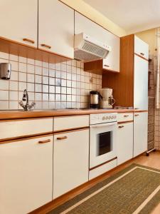 Kuchyň nebo kuchyňský kout v ubytování Haus Alpenrose