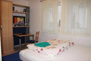Ein Bett oder Betten in einem Zimmer der Unterkunft Amselstern Binz