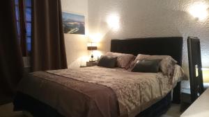 Кровать или кровати в номере VILLA Zaphira