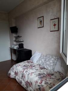A bed or beds in a room at Villa Fabbri