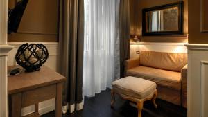 A bed or beds in a room at The B Place