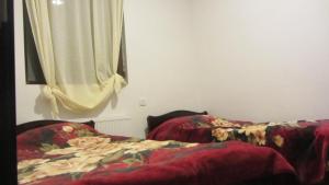 Ліжко або ліжка в номері Guest House Adelina