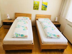 Ein Bett oder Betten in einem Zimmer der Unterkunft Wei Wei's Hostel
