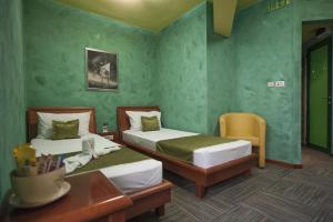 Uma cama ou camas num quarto em Hotel Kerber