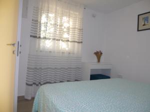 Postel nebo postele na pokoji v ubytování Apartment Marija