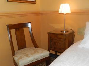 A bed or beds in a room at Bigo Guest House