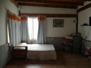 Ένα ή περισσότερα κρεβάτια σε δωμάτιο στο CABAÑAS LA GUADALUPE +12 φωτογραφίες
