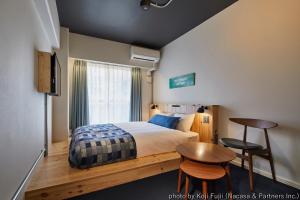 Postel nebo postele na pokoji v ubytování Anchor Hotel Fukuyama